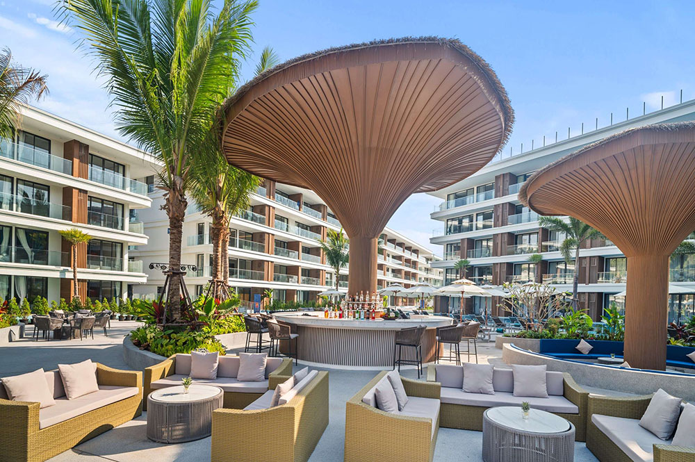 Pool bar dining atmosphere at Kora Beach Resort Phuket