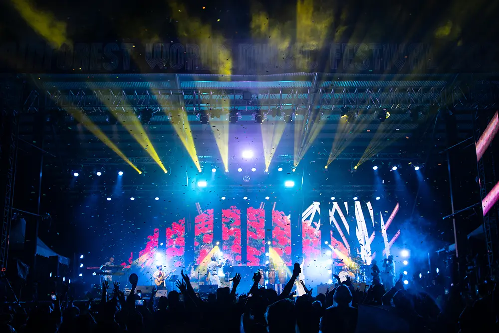 Outdoor music festival atmosphere at Rainforest World Music Festival